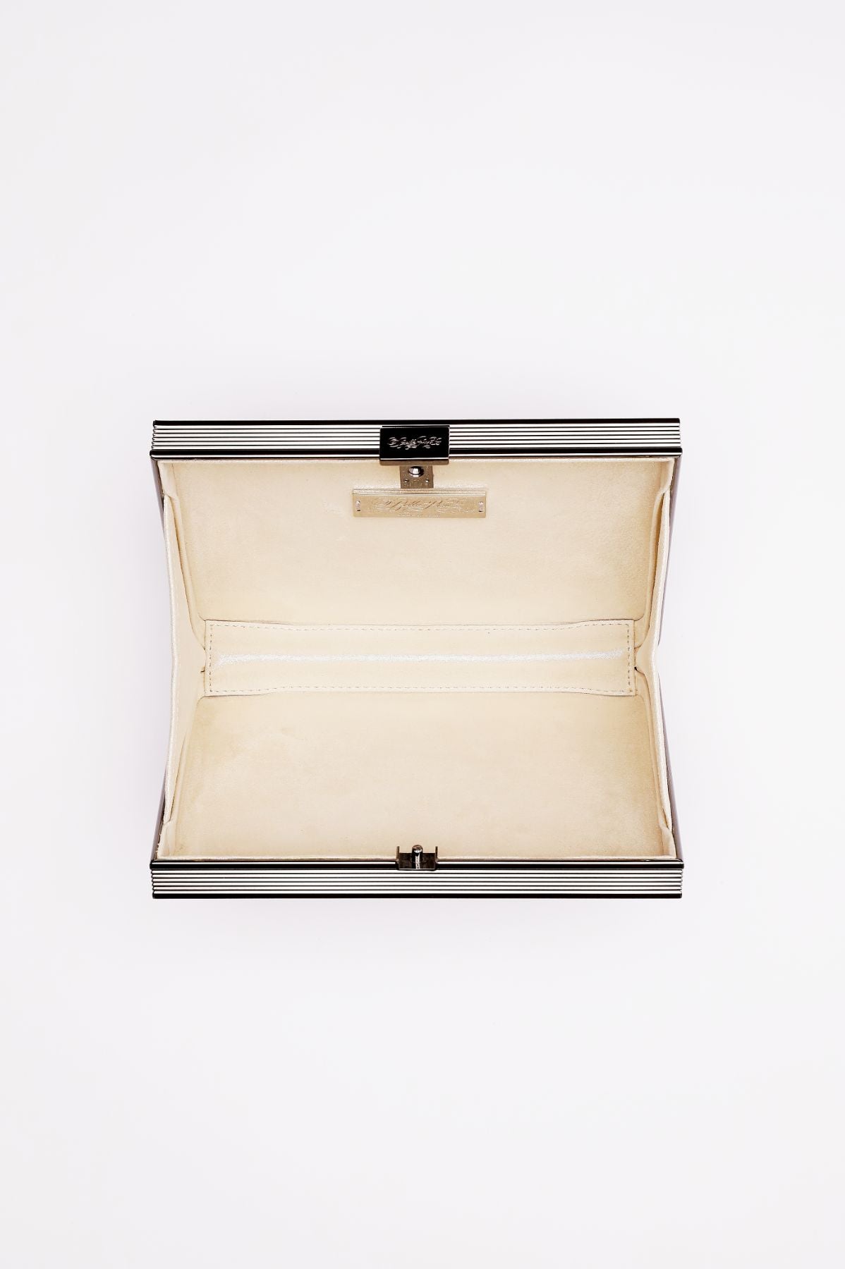 The Bella Rosa Collection’s Venezia Pearl Encrusted Bridal Clutch is rectangular and features a hinged lid, shown open to reveal a cream-colored, empty interior.