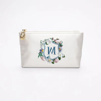 A Mia - Clear Acrylic Clutch with Floral Monogram Embroidery from The Bella Rosa Collection.