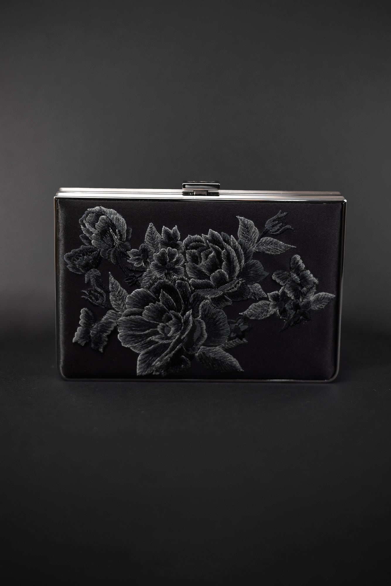 The Bella Rosa Collection's Venezia Clutch x MICAELA in Black Satin with Floral Embroidery is now available at the sample sale.