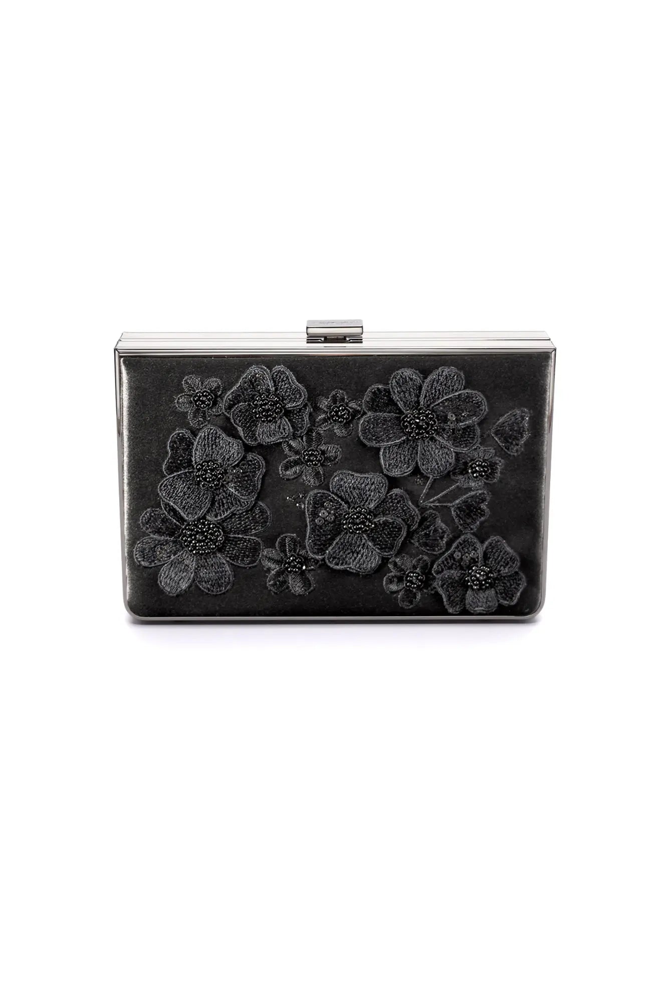 Description: The Venezia Clutch x MICAELA Black Satin Floral Embroidery from The Bella Rosa Collection is a rectangular black clutch bag adorned with intricate 3D floral embroidery, available in the Sample Sale.