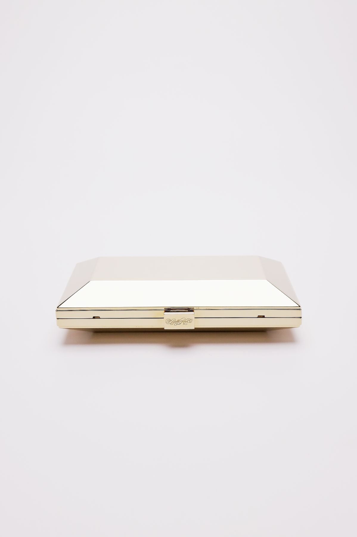 Top closed view of Milan geometric clutch in gold.