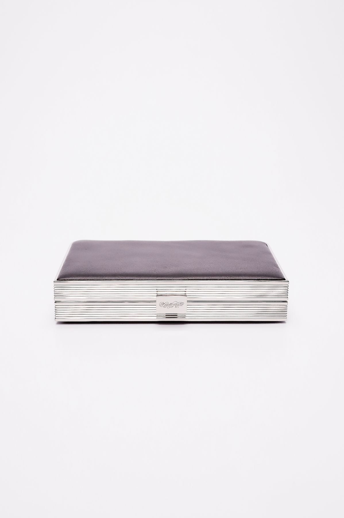 Top closed view of Venezia clutch in black leather.