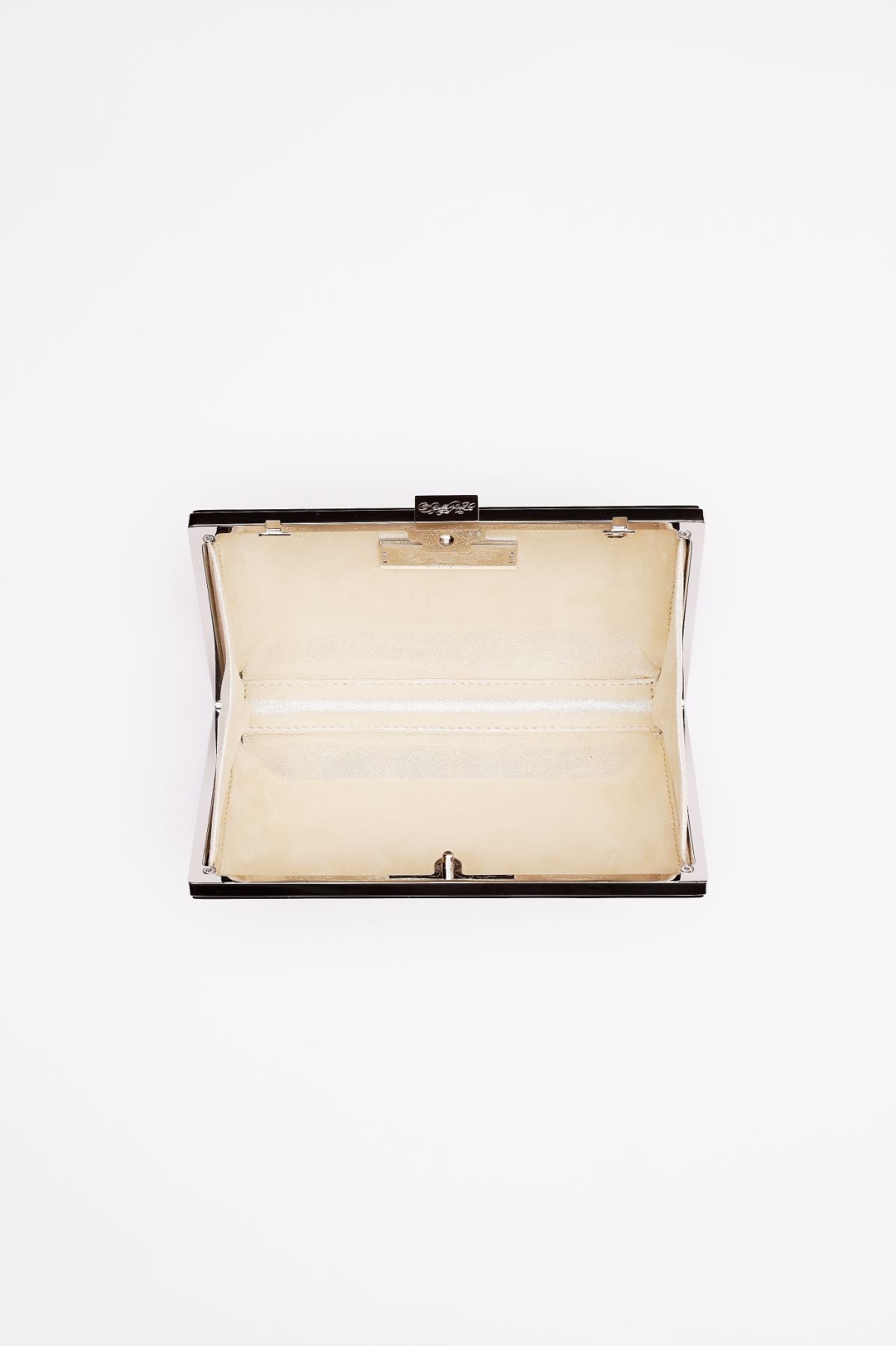 Top open view of Milan geometric clutch in silver.