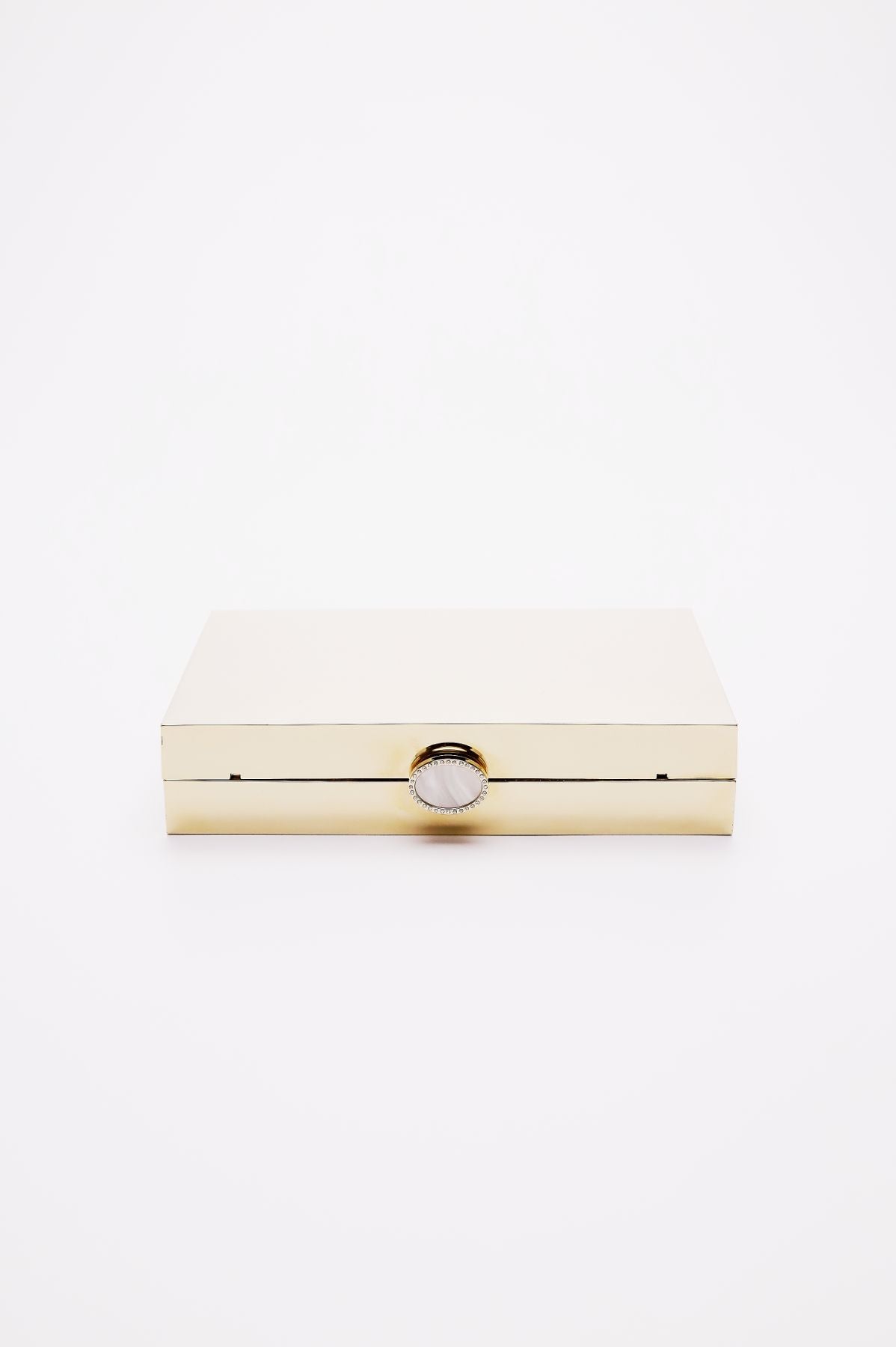 Side top view of Ella Clutch closed in gold mirror finish.