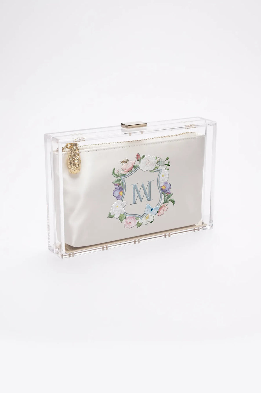 A Mia - Clear Acrylic Clutch with Floral Monogram Embroidery from The Bella Rosa Collection.