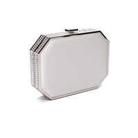 Elegant The Bella Rosa Collection Como Clutch in white satin with gemstone embellishments on a white background.