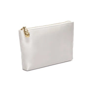 Hayden Clutch by The Bella Rosa Collection, featuring an ivory satin zippered pouch with a gold-tone tassel charm on a white background, showcasing elegant craftsmanship.