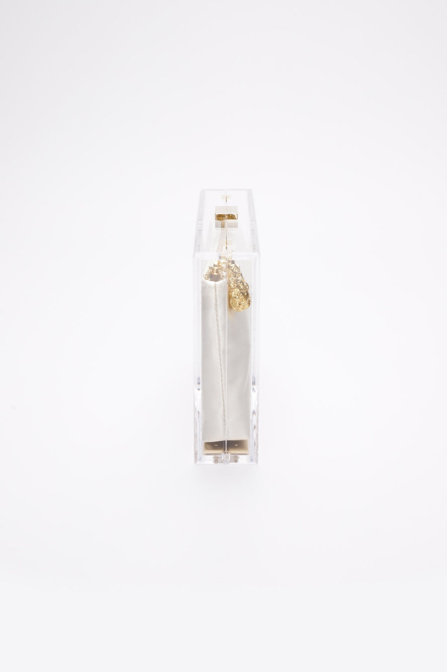 Side view of the clear acrylic Mia body with white satin pouch..
