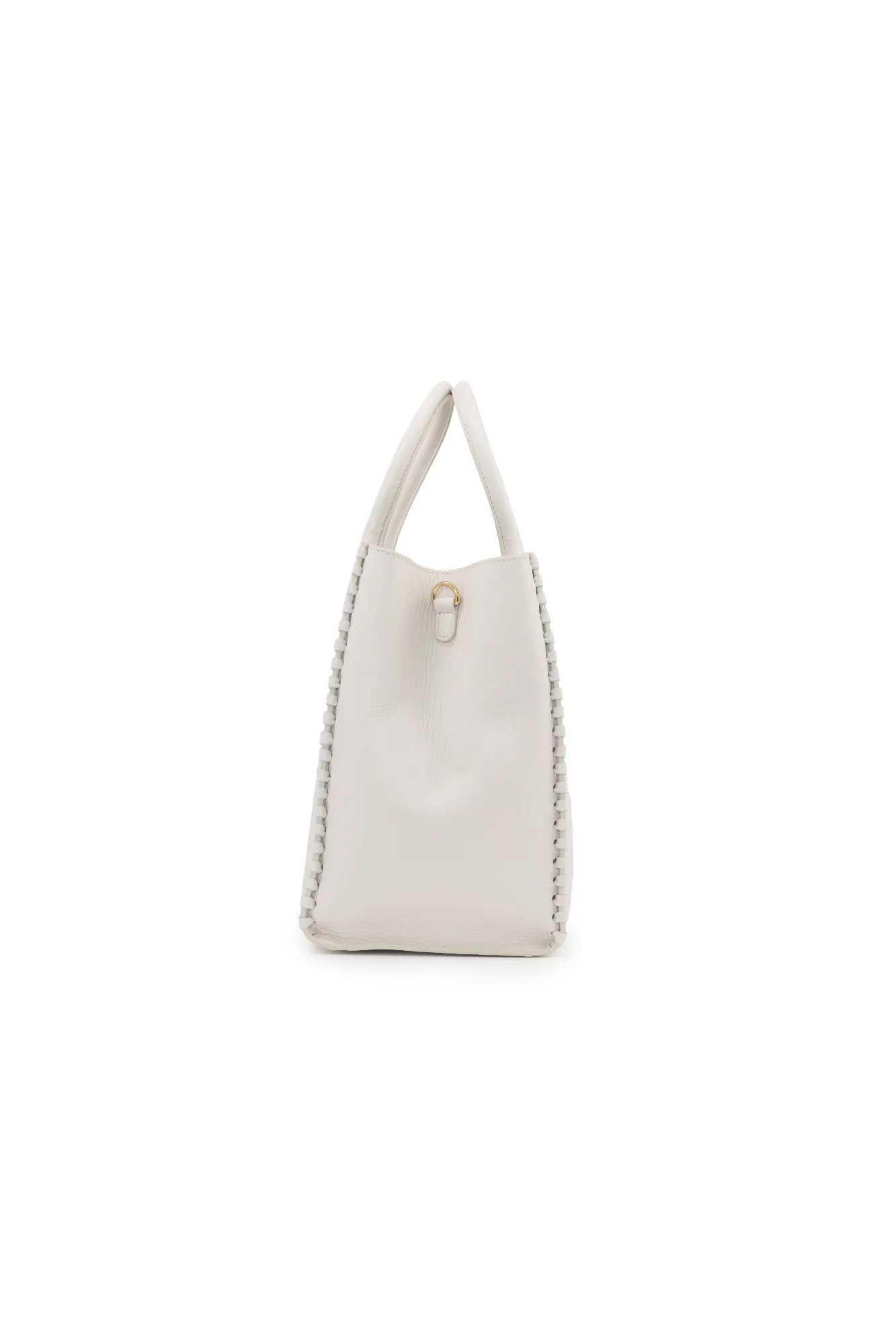 The LOVE Tote - White from The Bella Rosa Collection is a versatile white leather tote bag featuring braided details on the sides and a single handle, perfect for your wedding day essentials and everyday use.