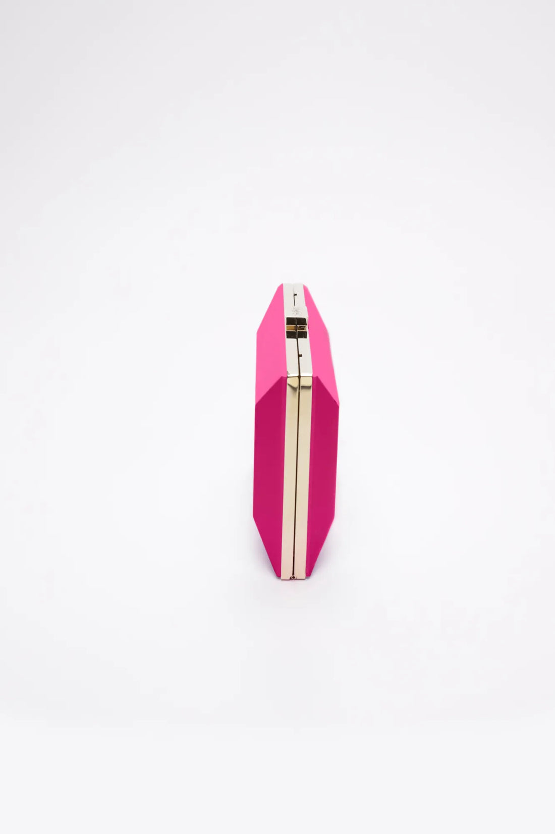 A Milan Clutch x MICAELA - Hot Pink Metallic from The Bella Rosa Collection on a white background.