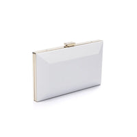 White Metallic Milan Clutch purse with a custom engraved sentiment plaque on a white background, The Bella Rosa Collection's Milan Clutch x MICAELA - Pearl White.