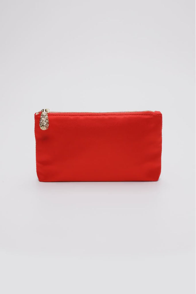 360 view of the Mia satin pouch purse in red.