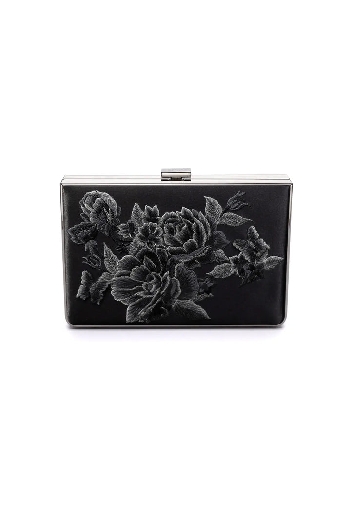 The Bella Rosa Collection's Venezia Clutch x MICAELA - Black Satin Floral Embroidery with floral embroidery design on a white background.