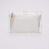 360 view of the clear acrylic Mia body with white satin pouch.