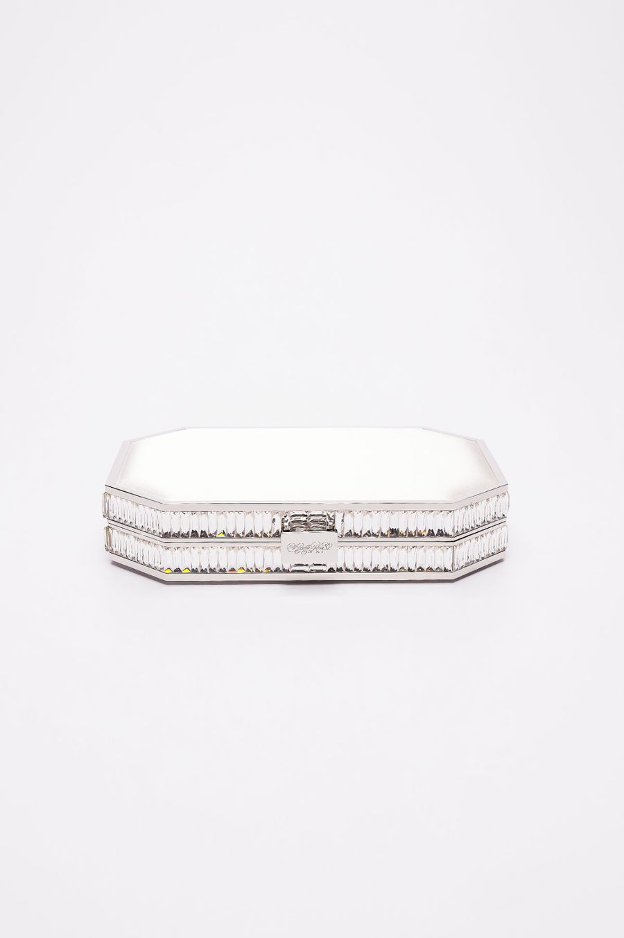 Top closed view of Como clutch in white satin with silver gemmed frame.