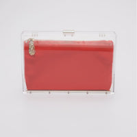 360 view of Mia Clutch a clear acrylic rectangle clutch with red satin interior pouch.