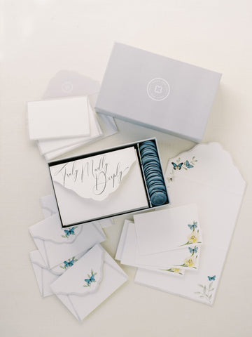 A set of white envelopes from The Bella Rosa Collection with a watercolor floral motif, perfect for the Wedding Day Love Note Box Stationery Set or vow note cards.