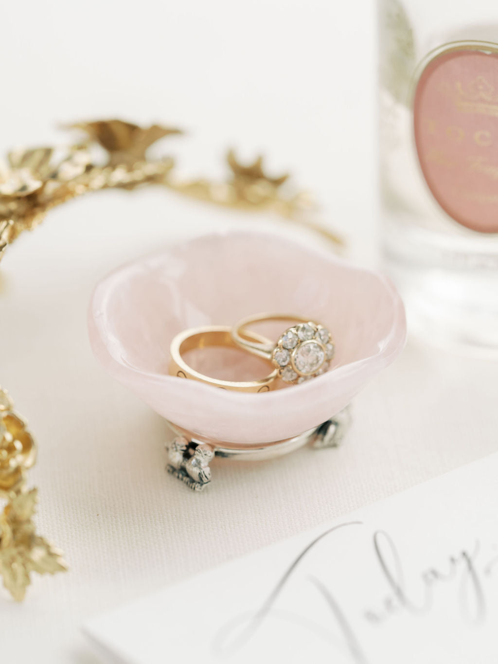Rose quartz engagement ring dish with silver love bird feet. Hand-carved quartz made in Italy for the perfect luxury bride gift.