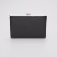 360 view of Venezia clutch with silver rectangle frame and a black leather side.