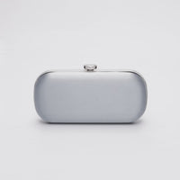 Silver satin bridal and evening clutch with silver hardware.