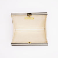 A beige and gold Venezia Bridal Pearl with Crystals Clutch x MICAELA on a white surface from The Bella Rosa Collection.