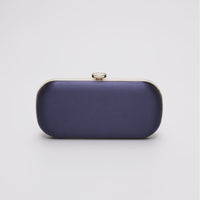 360 view of Bella Clutch in dark navy blue with silver hardware accents and stimulated mother of pearl clasp.