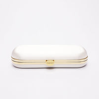 Top closed view of Bella Clutch in Ivory white satin with gold hardware frame.