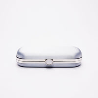Top closed view of Bella Clutch in Steel Blue satin with silver hardware frame.