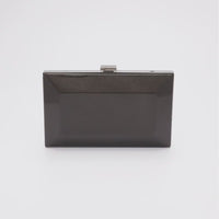360 view of Milan clutch with a geometric beveled metal frame in black.