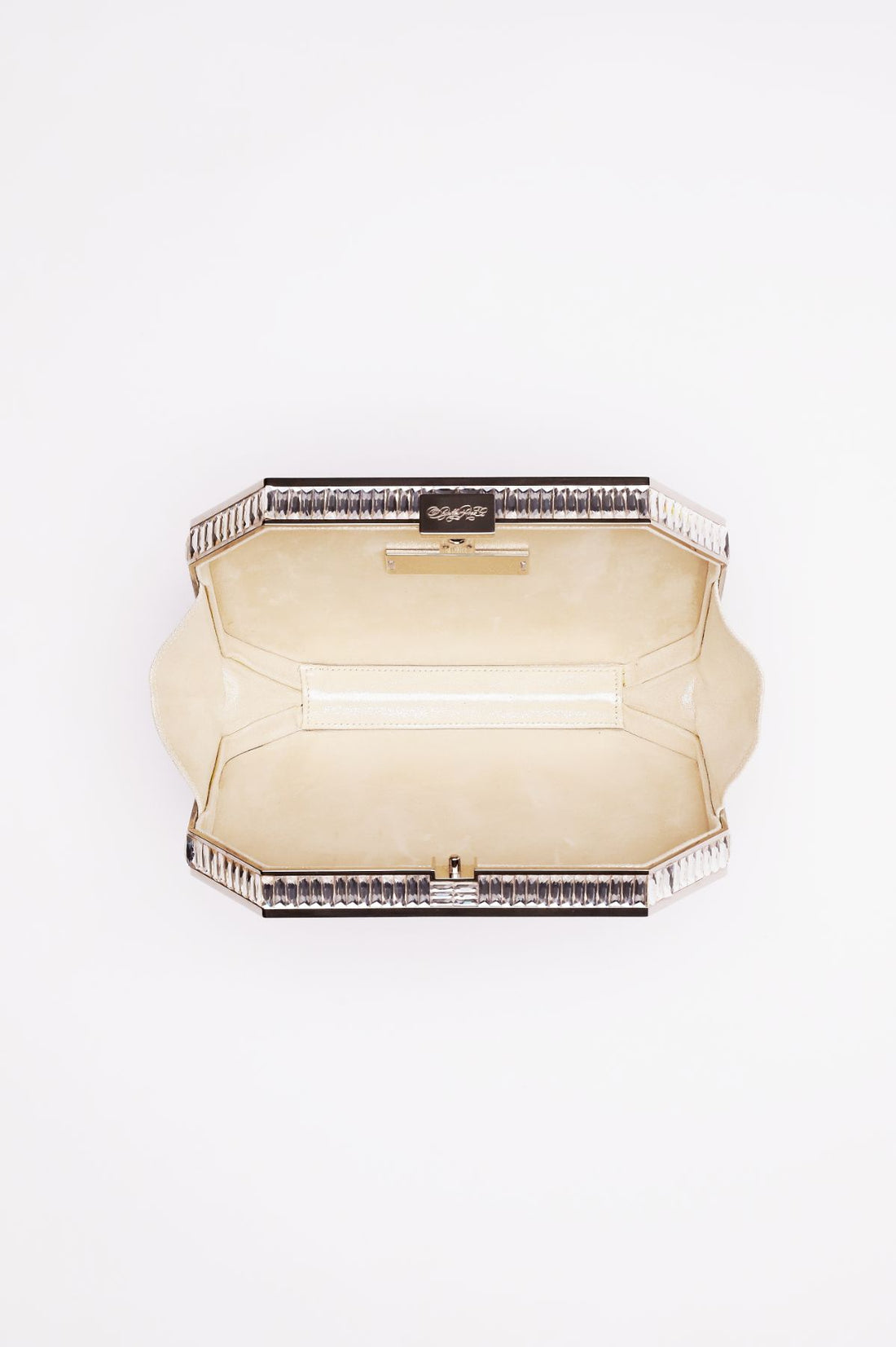 Top open view of Como Clutch with a octagon silhouette in black satin and silver gemmed frame.