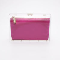 Mia Clutch with clear acrylic rectangle body with a hot pink satin interior pouch.