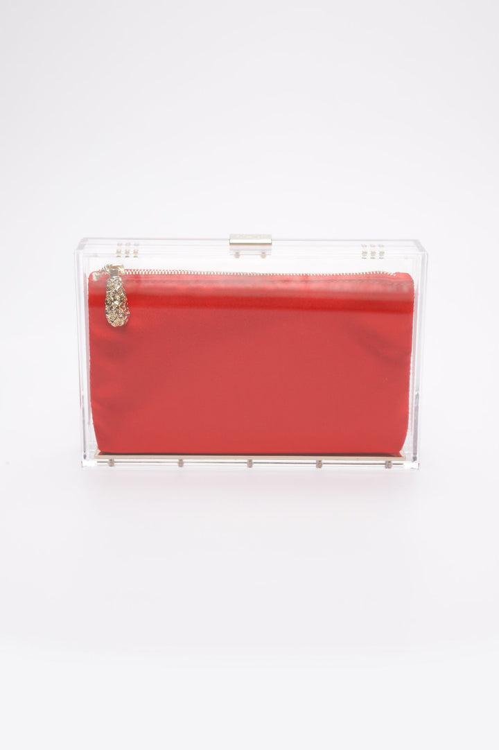 The Mia Clutch what a clear acrylic rectangle hard case with an interior red satin pouch.