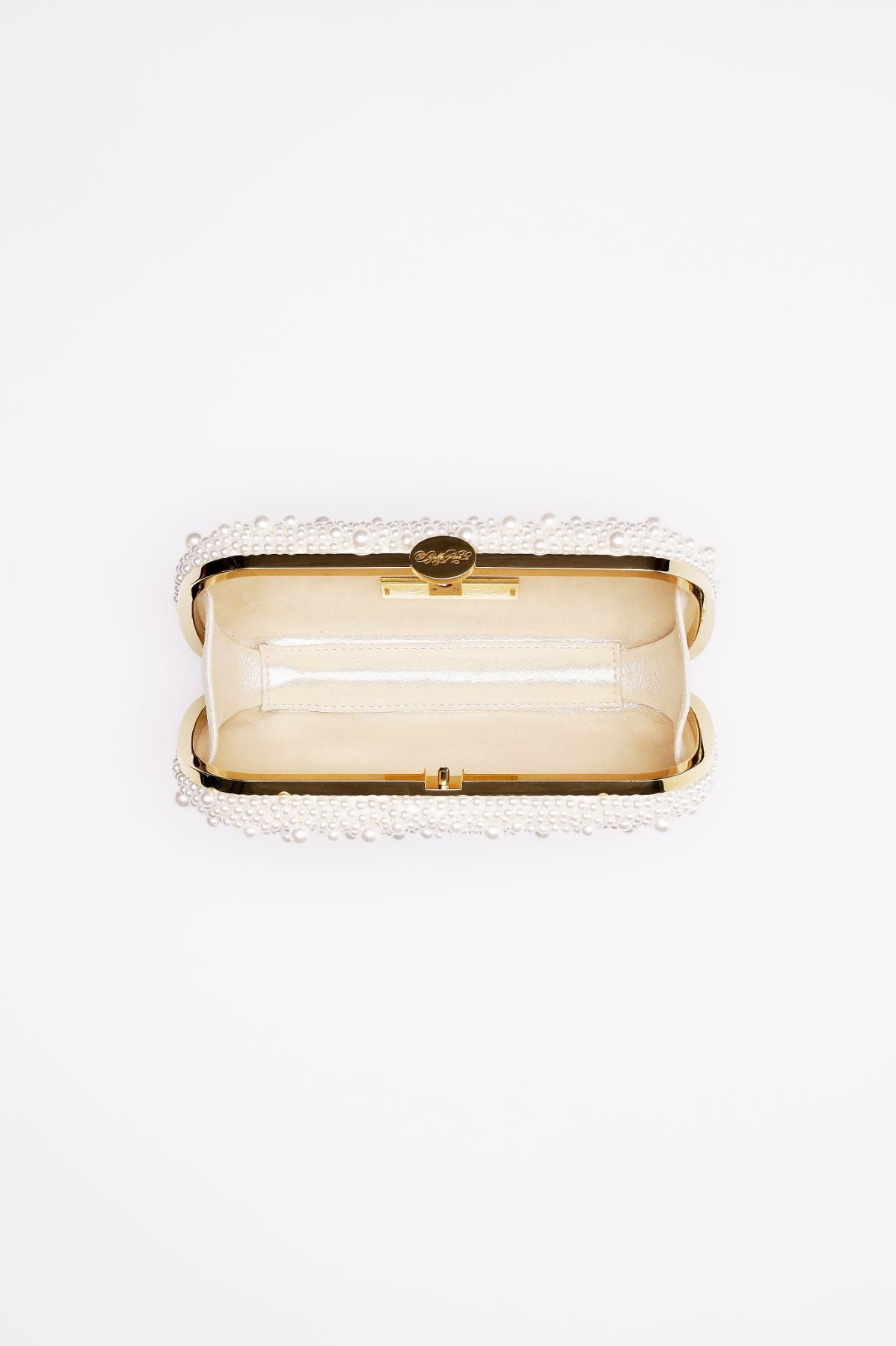 An open empty Bella Rosa Collection bridal clutch purse with a metallic clasp, viewed from above.
