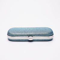 Top closed view of Shimmer Bella Clutch in Ocean Blue with silver clasp.