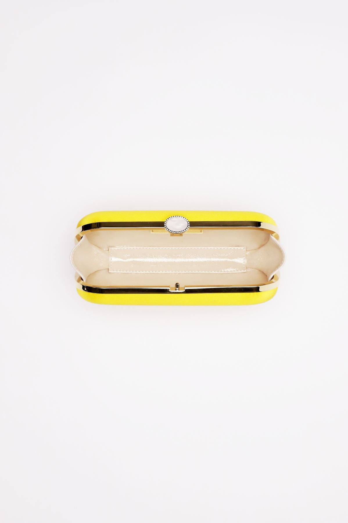 A Bella Clutch Limoncello Yellow Petite by The Bella Rosa Collection with a white interior and a silver clasp on a white background.