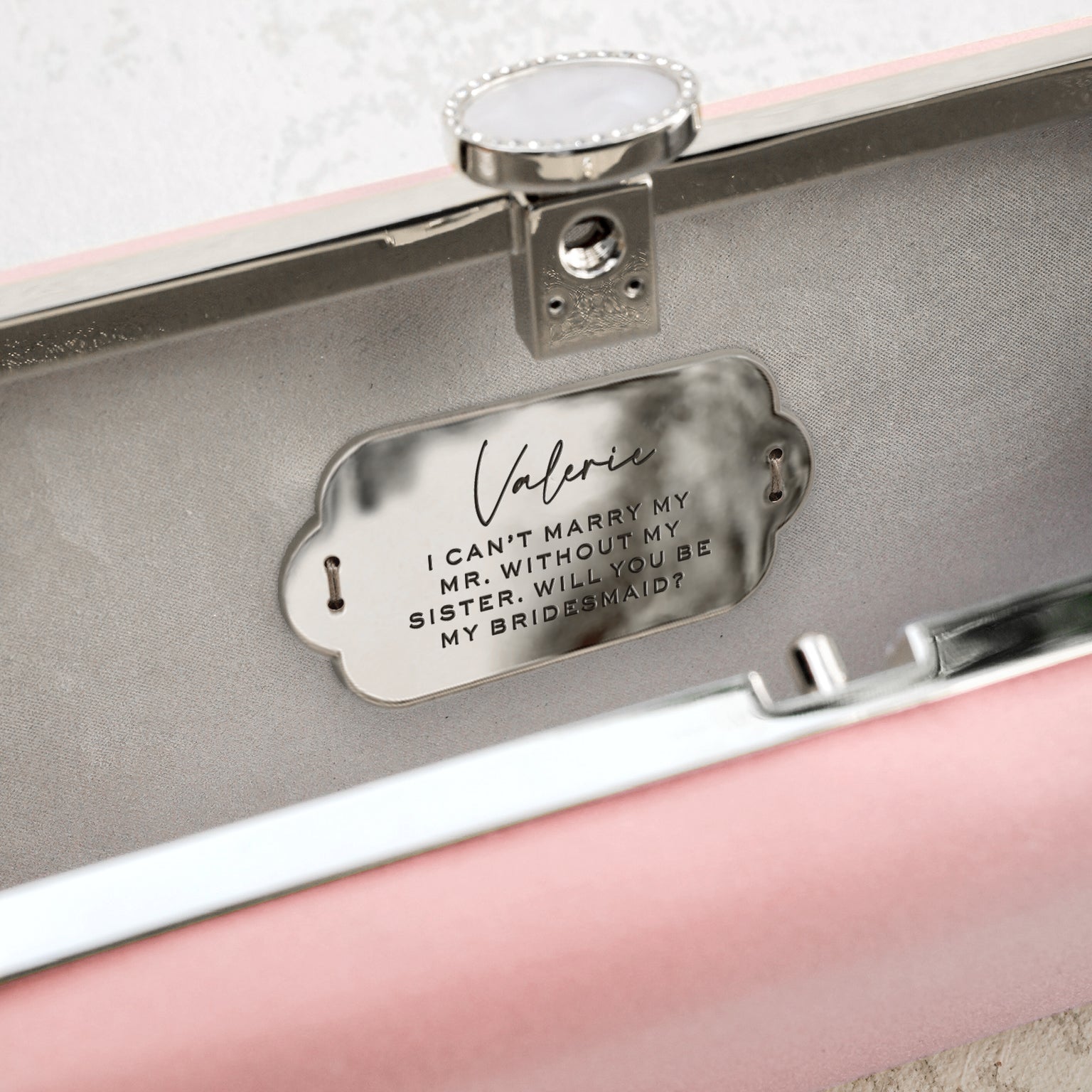 A customized Bridesmaid Proposal Box with Engraved Bella &#39;Be My Bridesmaid&#39; Clutch Bag Gift from The Bella Rosa Collection for bridesmaids.