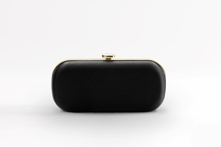 Front view of bridal and evening Bella Clutch in black with gold hardware accents and stimulated mother of pearl clasp.