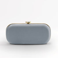 Front view of bridal Bella Clutch in silver with gold hardware accents and stimulated mother of pearl clasp.