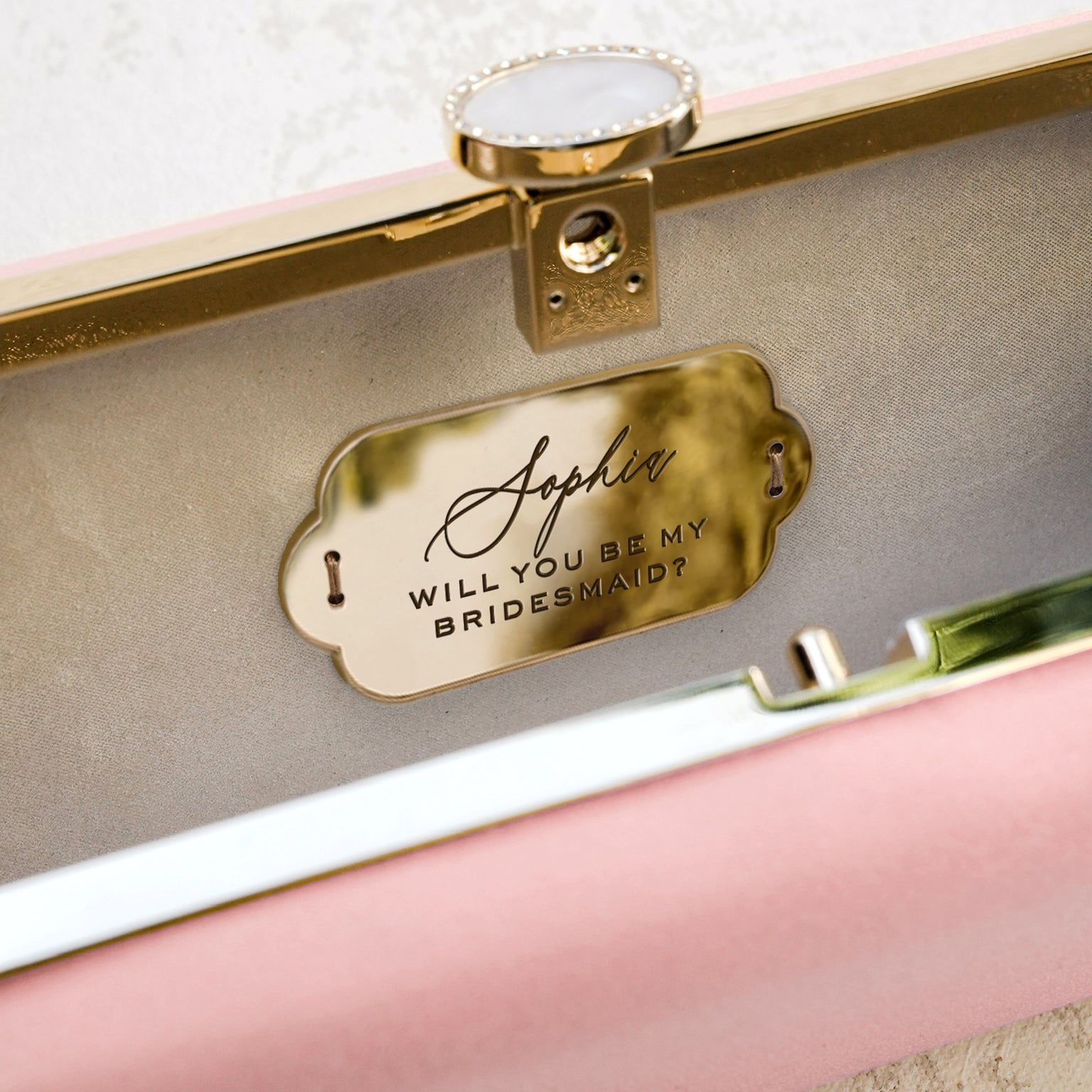 A customized Bridesmaid Proposal Box with Engraved Bella &#39;Be My Bridesmaid&#39; Clutch Bag Gift from The Bella Rosa Collection, perfect for bridesmaids.