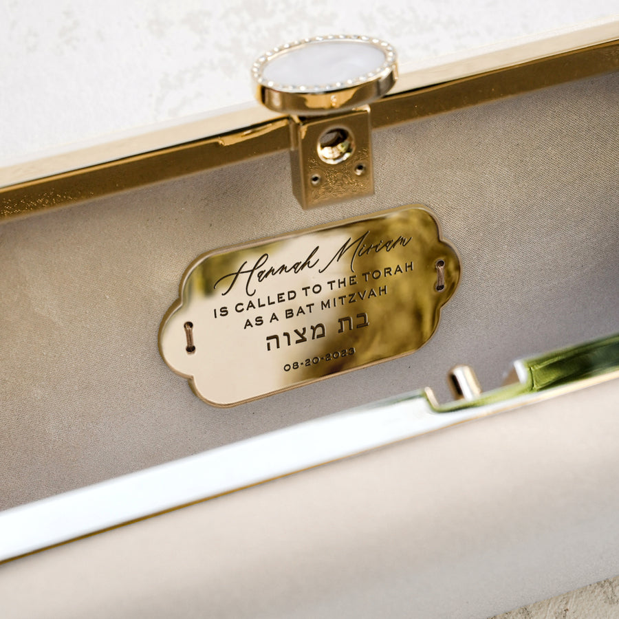 The Bat Mitzvah Personalized Bella Clutch Petite - a personalized gift perfect for a Bat Mitzvah celebration. This stunning gold and silver clutch from The Bella Rosa Collection features a name on it to create a unique and memorable keepsake.