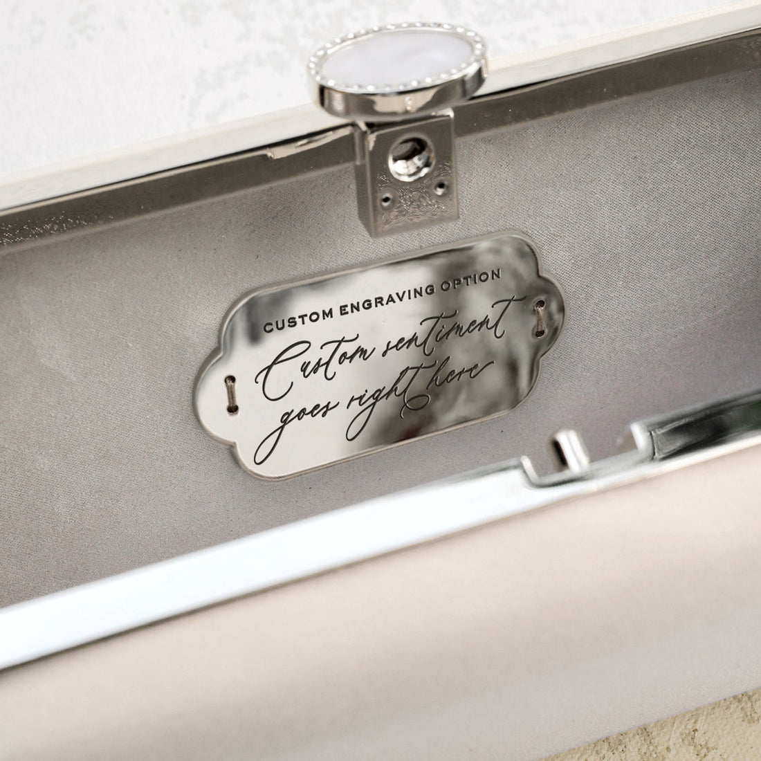 A silver box with a personalized message for the Bat Mitzvah, the Bat Mitzvah Personalized Bella Clutch Petite from The Bella Rosa Collection.