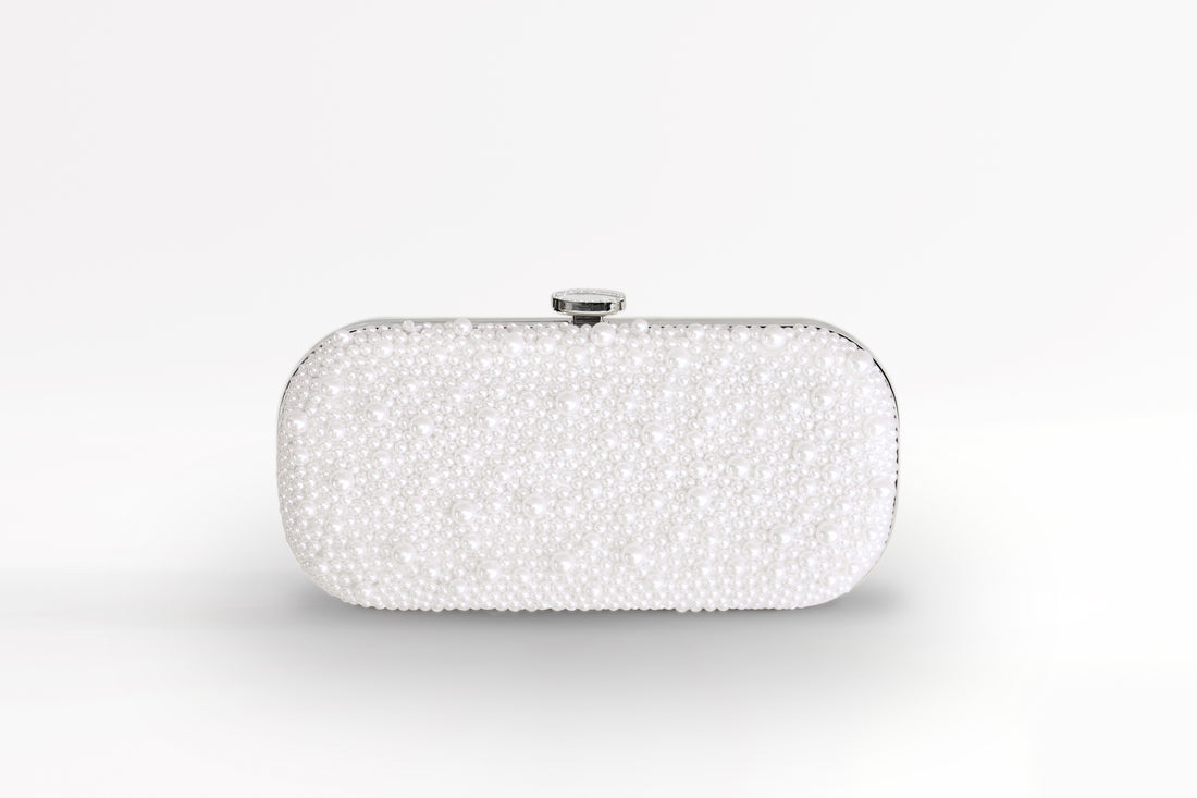 An Over the Moon True Love Bella Pearl Clutch on a white background.