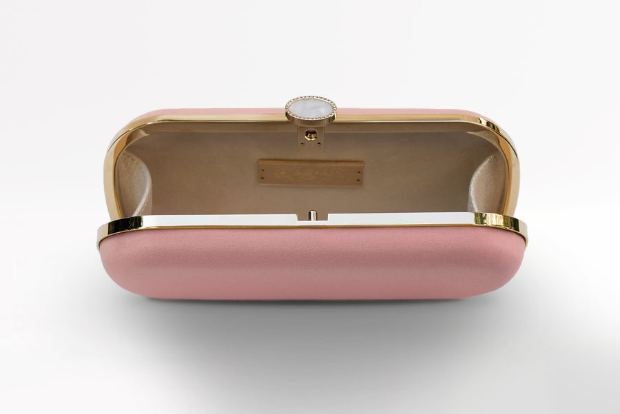 The Bat Mitzvah Personalized Bella Clutch Petite, from The Bella Rosa Collection, is a stunning pink clutch bag with a gold clasp.