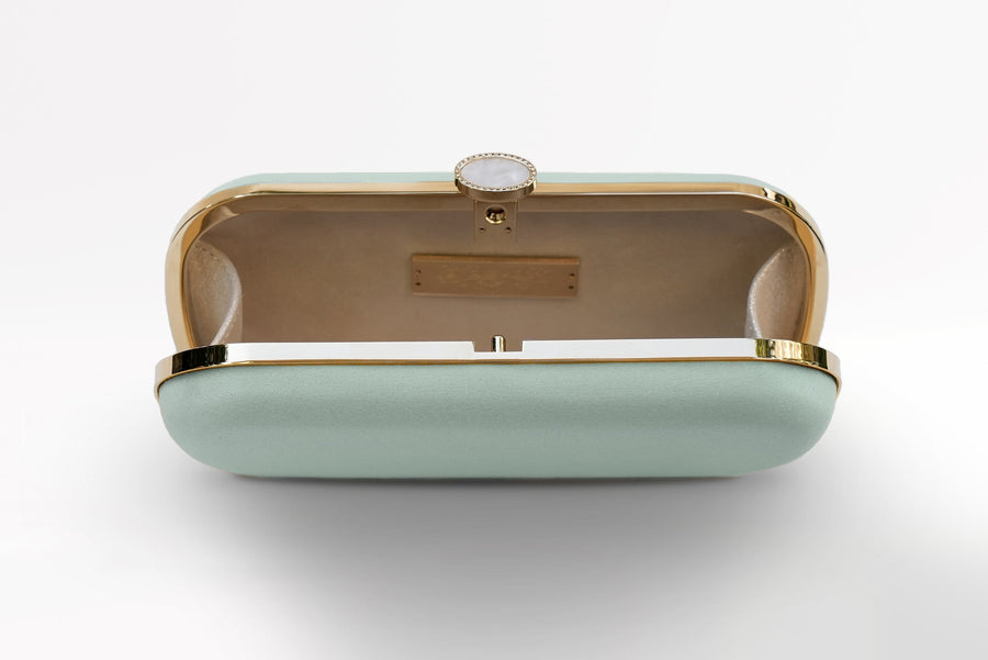 The Bat Mitzvah Personalized Bella Clutch Petite from The Bella Rosa Collection, in a refreshing mint green shade, featuring a luxurious gold clasp, makes for an exquisite personalized gift for a Bat Mitzvah.