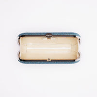 Top open view of Shimmer Bella Clutch in Ocean Blue with silver clasp.