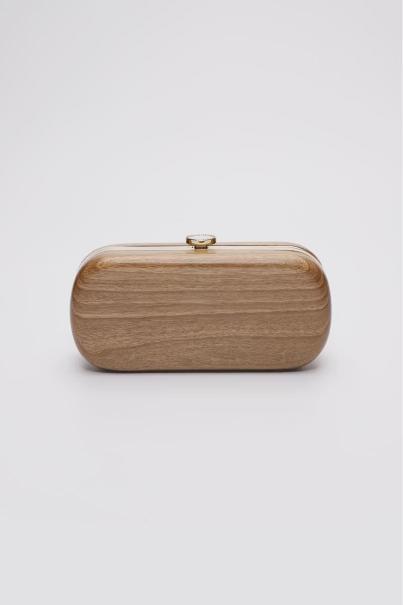 360 view of Bella Clutch with gold hardware frame in a solid Walnut Wood body.