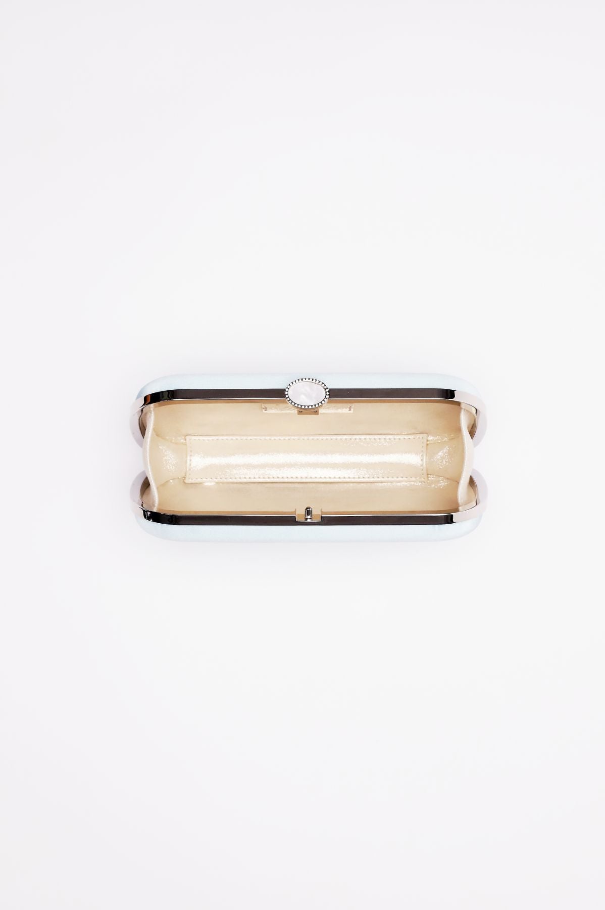 An overhead view of an open cream-colored rectangular Mini Cinderella Blue Bella Clutch on a white background. 
is replaced with:
An overhead view of an open cream-colored rectangular Bella Clutch Cinderella Blue Petite from The Bella Rosa Collection on a white background.