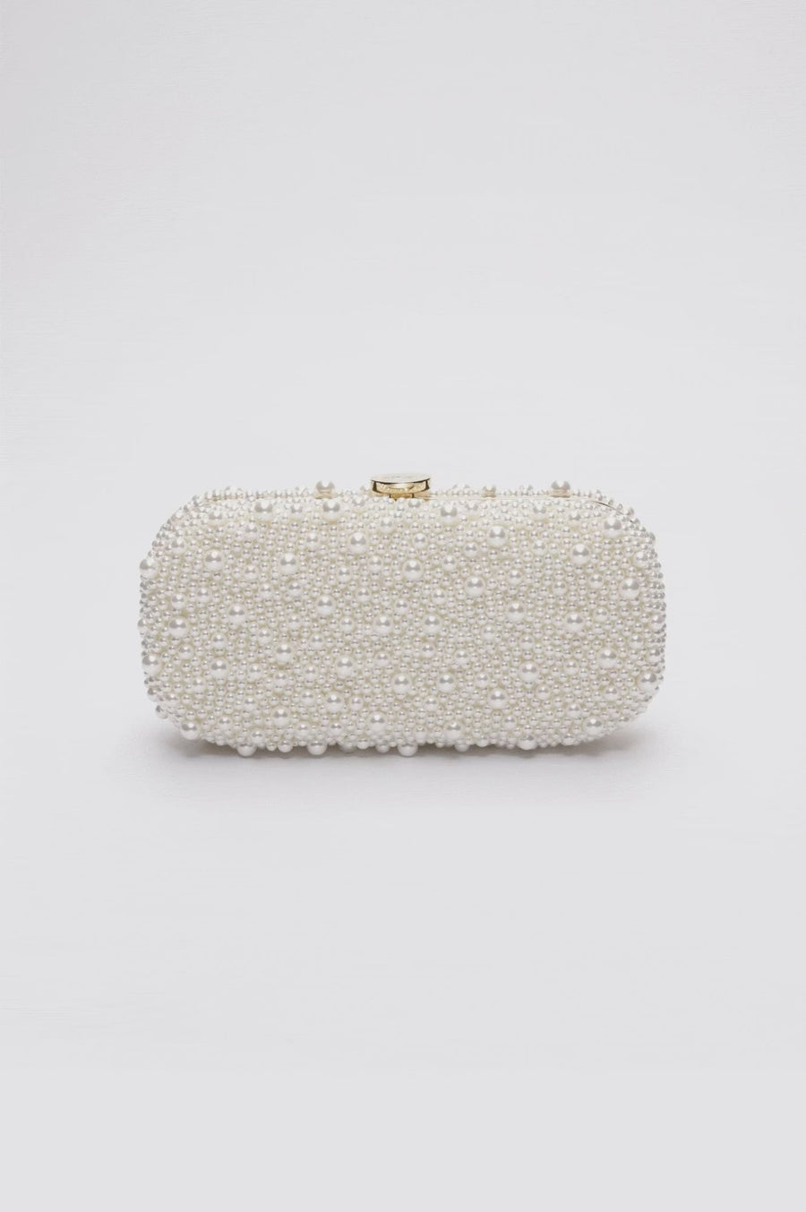 360 vide of the True Love Pearl Clutch with hand-sewn pearls with a gold hardware frame.