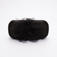 Front view of Bella Fiori Clutch in black satin with black flower adored on front side.