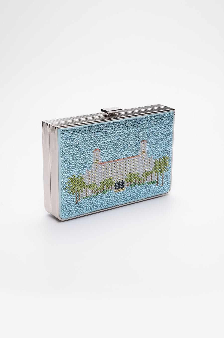 A Breakers Crystal Rhinestone Clutch from The Bella Rosa Collection, inspired by Palm Beach, with a blue building on it.